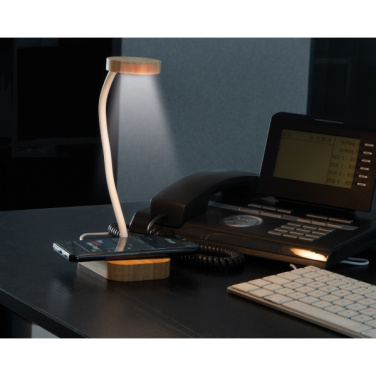 Logo trade firmakingi pilt: Juhtmeta laadijaga laualampTomsk